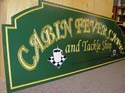 custom_shaped_carved_and_painted_sign_85
