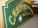 custom_shaped_carved_and_painted_sign_84